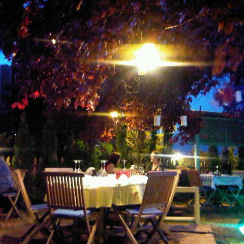 Photo taken at Tenes Bozcaada Balık Restoranı by Esra on 7/5/2013