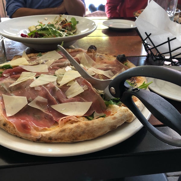 I had the Cristina pizza. It was perfect and served with giant scissors!