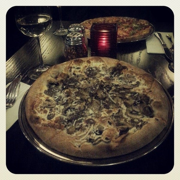 Photo taken at Goodfella&#39;s Pizza &amp; Restaurant by Karla V. on 1/31/2014