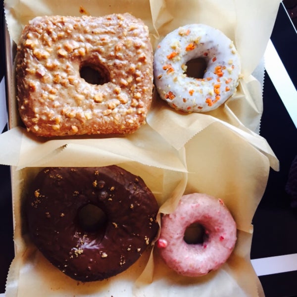 Photo taken at Doughnut Plant by Victoria D. on 4/24/2015