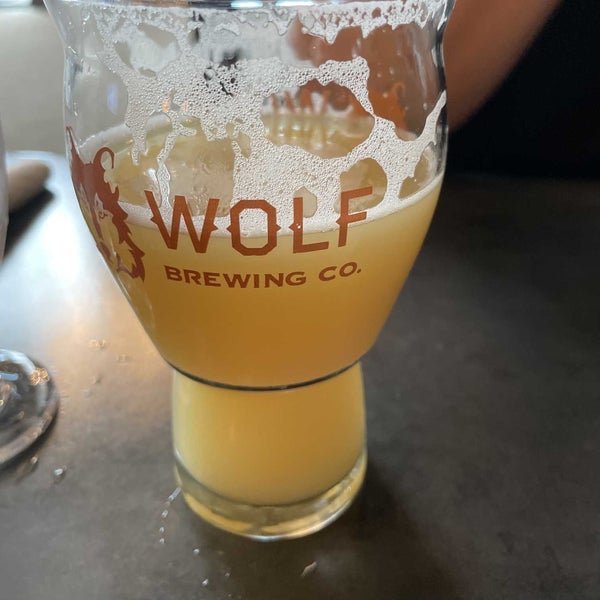 Photo taken at Wolf Brewing Co. by Drew P. on 8/4/2022