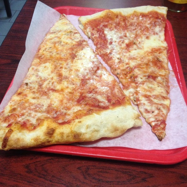 Photo taken at Gina&#39;s Pizzeria and Restaurant by Natalia P. on 7/30/2014