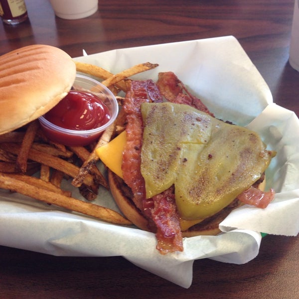 Photo taken at Grizzly Burger House by Robert D. on 6/9/2014