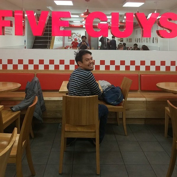 Photo taken at Five Guys by Jason V. on 5/8/2015