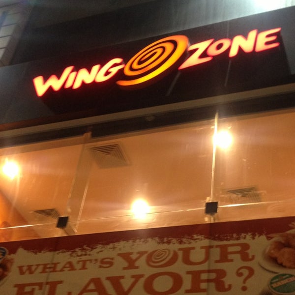 Photo taken at Wing Zone by Omar R. on 3/31/2013