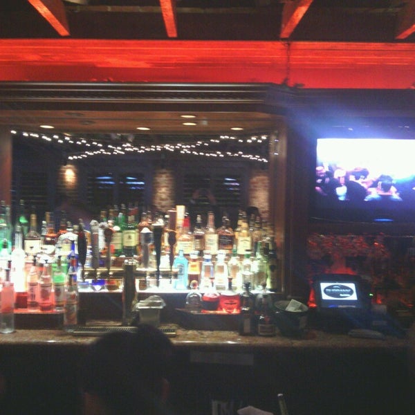 Photo taken at Burbank Bar &amp; Grille by Ricardo R. on 5/12/2013