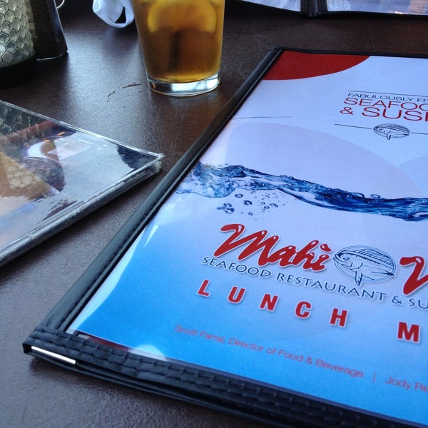 Photo taken at Mahi Mah&#39;s Seafood Restaurant by Tina L. on 4/17/2013