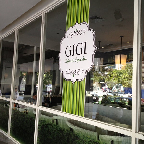 Photo taken at GIGI Coffee &amp; Cupcakes by Jacki E. on 5/7/2013