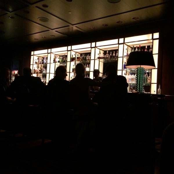 Photo taken at The Bar at The Peninsula by Carlos R. on 3/16/2014