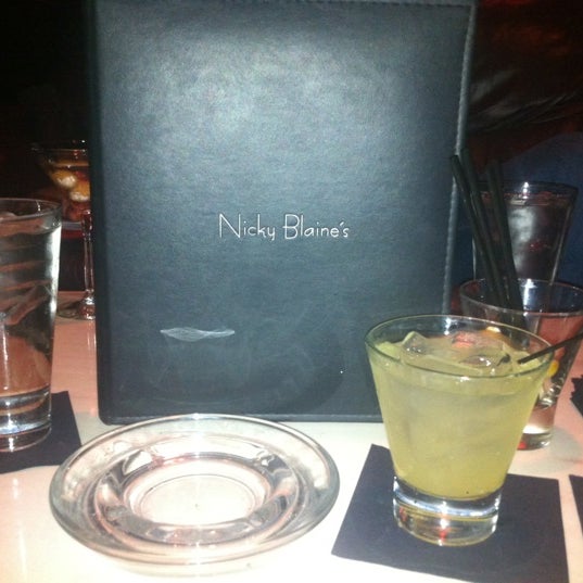 Photo taken at Nicky Blaine&#39;s Cocktail Lounge by Meshi D. on 12/15/2012