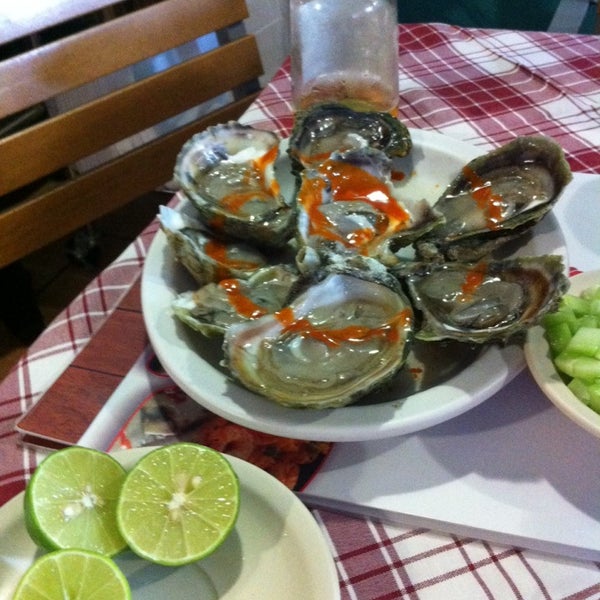 Photo taken at Silver Mariscos by mariel g. on 6/2/2014
