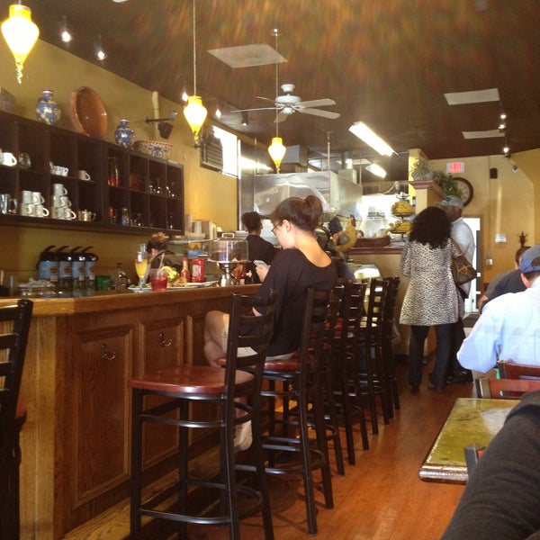 Photo taken at Bella&#39;s Cafe by Jake P. on 5/4/2013