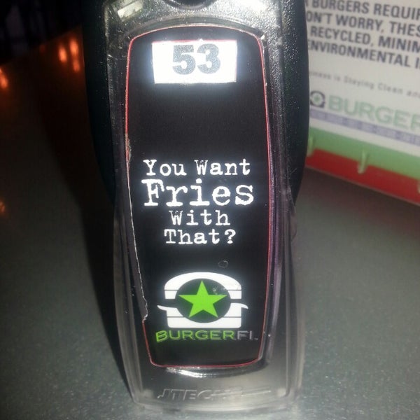 Photo taken at BurgerFi by C.K. A. on 5/10/2014