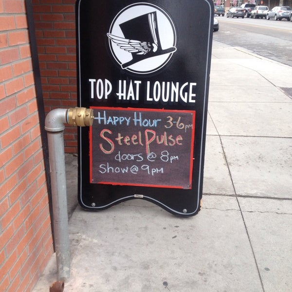 Photo taken at Top Hat Lounge by Luis C. on 4/22/2014