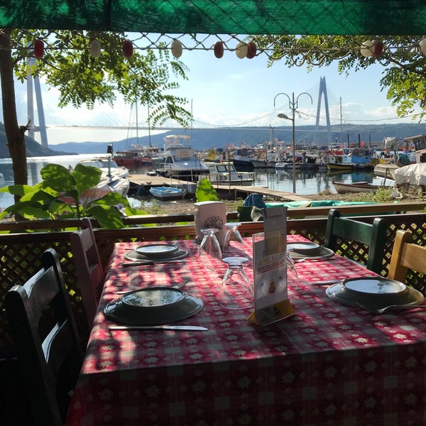 Photo taken at Poyrazköy Sahil Balık Restaurant by Kivanc Y. on 9/23/2017