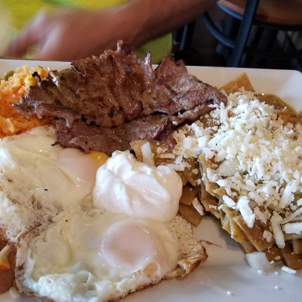 Check out this massive chilequiles platter with steak! Delicious! Also loved the steak skewer dish- kinda pricy for the portion though. Perfect horchata & hibiscus water.
