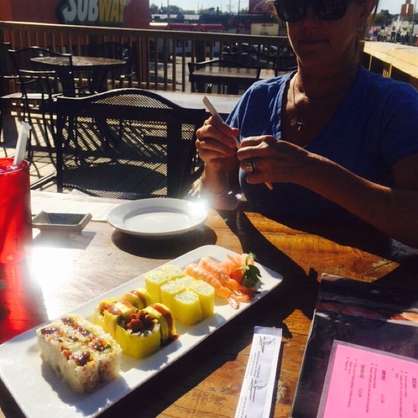 Cold beer, sunshine and sushi.