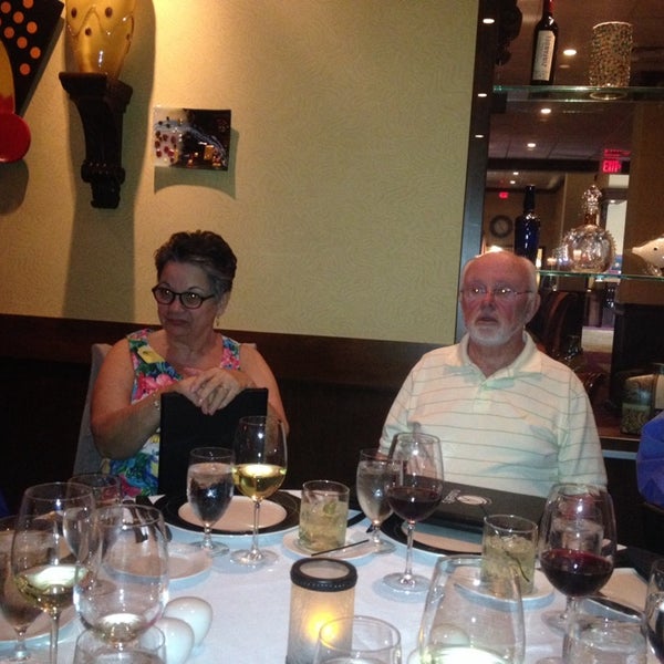 Photo taken at Russell&#39;s Steaks, Chops, &amp; More by Joel C. on 5/11/2014