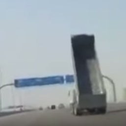 Truck Crashes into a Highway Sign (29-second video)