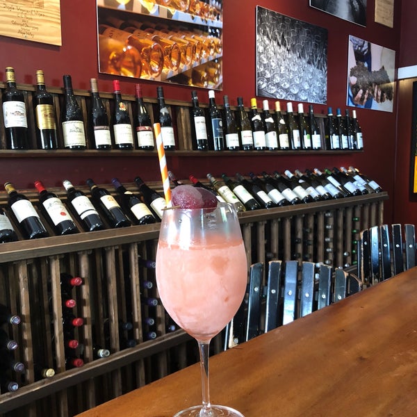 Photo taken at Grand Vin Wine Shop &amp; Bar by Cindy C B. on 10/12/2018