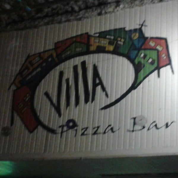 Photo taken at Villa Pizza Bar by Stefani G. on 7/14/2013