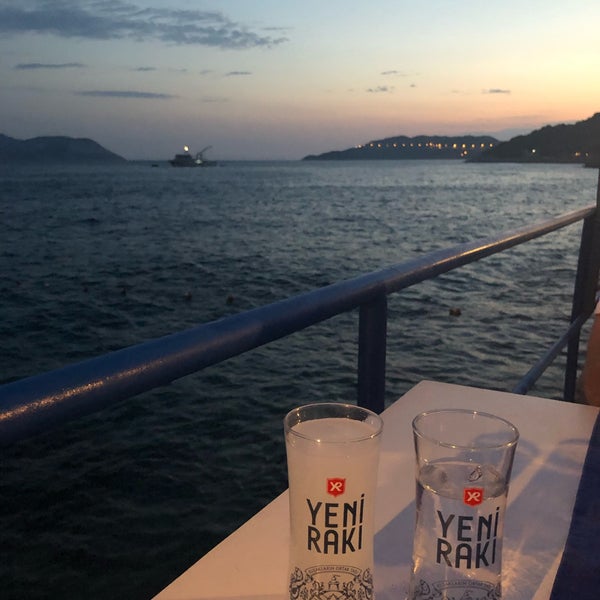Photo taken at Kaş&#39;ın Meyhanesi &amp; Kaş&#39;s Beach by Ceylan B. on 7/15/2019