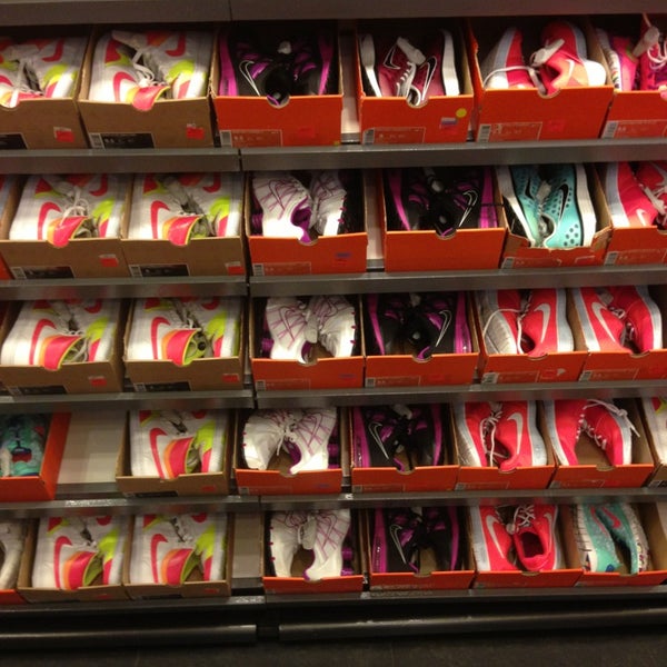 Photo taken at Nike Factory Store by Jessie A. on 6/25/2013