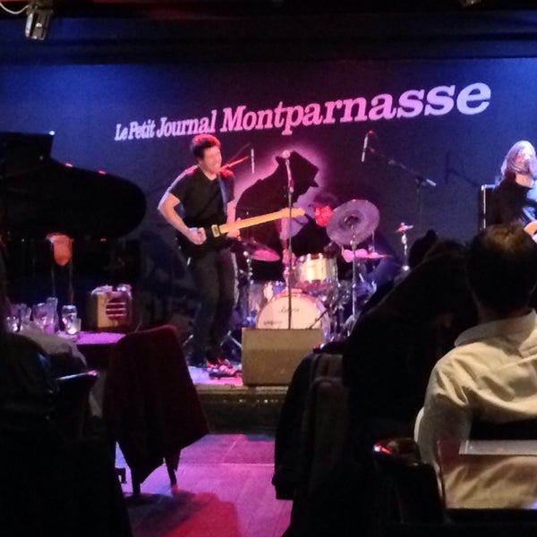 Photo taken at Le Petit Journal Montparnasse by Alfonso S. on 2/21/2014