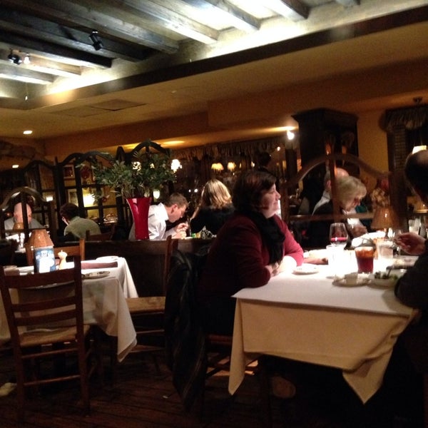 Photo taken at Paesano Italian Restaurant and Wine Bar by Bradley P. on 1/1/2014