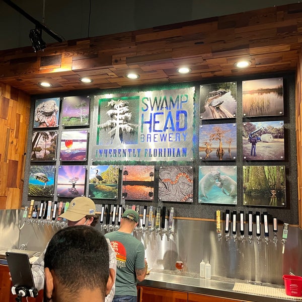 Photo taken at Swamp Head Brewery by Rachel P. on 1/22/2022