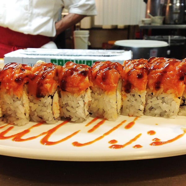 ICHI - spicy salmon on top of Krunch Roll, finished with eel sauce on top.