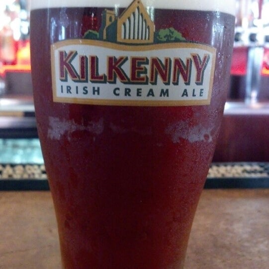 Photo taken at Shenanigans Irish Pub &amp; Grille by Angela S. on 8/7/2013