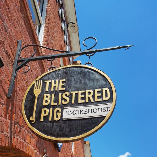 Photo taken at The Blistered Pig Smokehouse by Jessica C. on 8/1/2015