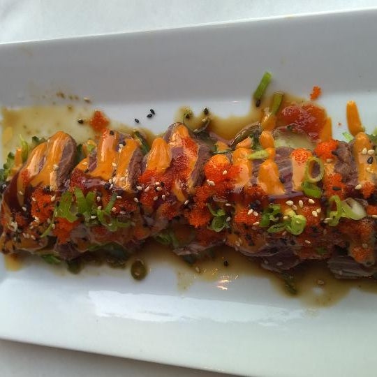 Foto scattata a Tangerine Fusion + Sushi Bar da Alejandro T. il 8/22/2014