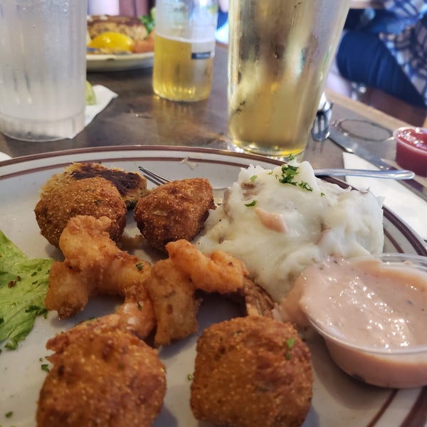 Photo taken at Big Fish Seafood Grill &amp; Bar by John O. on 5/27/2019