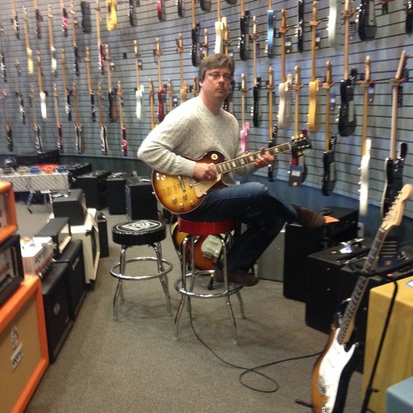 Photo taken at Long &amp; McQuade Musical Instruments by Annette K. on 3/8/2014