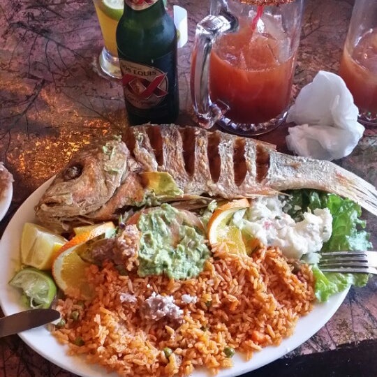 Photo taken at El Pescador Mexican Grill by Hernan L. on 12/24/2013