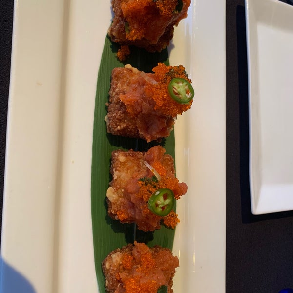Photo taken at Okura Robata Sushi Bar and Grill by Danielle L. on 4/16/2019