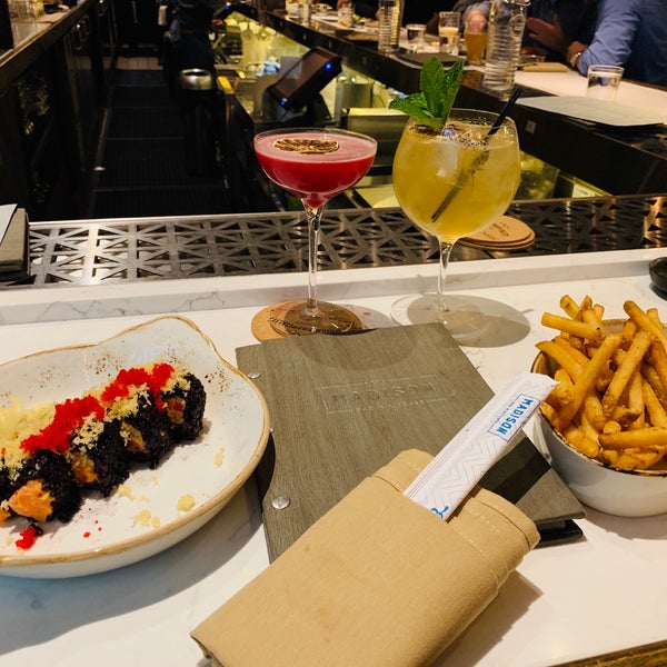 Photo taken at The Madison Bar &amp; Kitchen by Awilda M. on 5/11/2019
