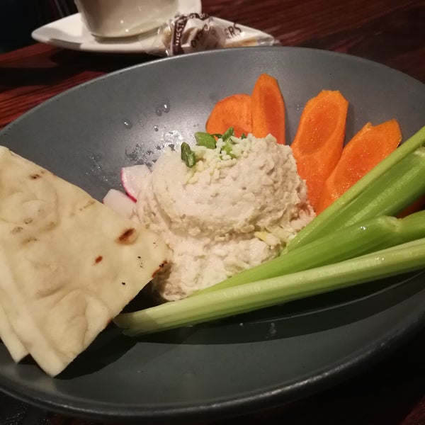 Photo taken at Houlihan&#39;s by Natalie L. on 3/10/2019