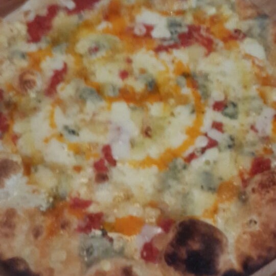 Photo taken at PepperJam Gourmet Pizza by Tolga O. on 3/20/2014