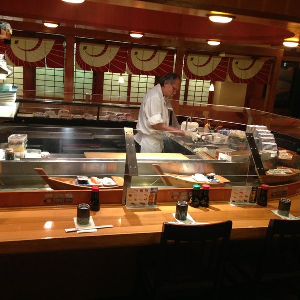 Photo taken at Sushi Boat by Rie on 4/10/2013