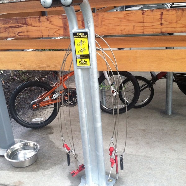 They have a really cool covered bike parking area and a little work station with a pump, a work stand with hand tools, and even a inner tube vending machine.