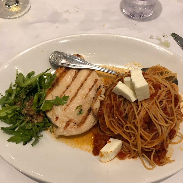Photo taken at Romano&#39;s Macaroni Grill by Jessica L. on 1/1/2020