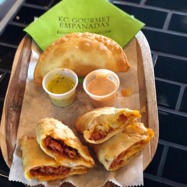 Photo taken at KC Gourmet Empanadas by Michael I. on 3/9/2019