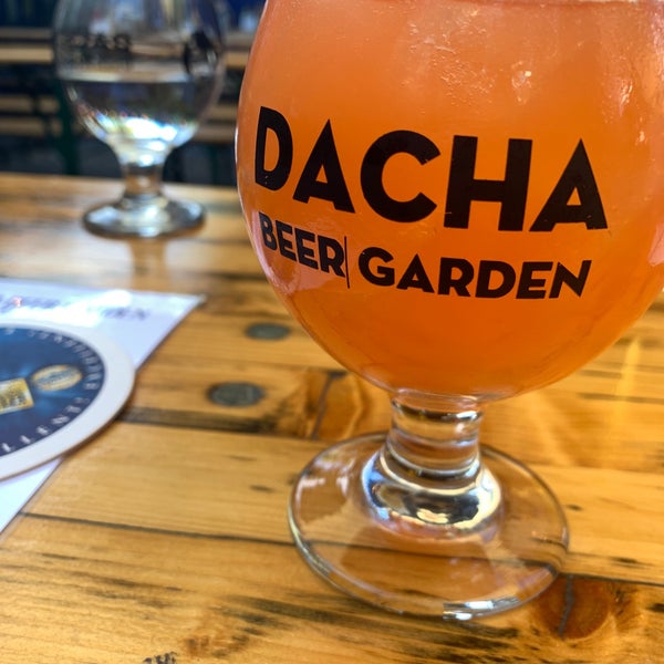 Photo taken at Dacha Beer Garden by Becca M. on 10/10/2019