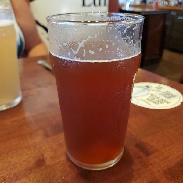 Photo taken at Outer Banks Brewing Station by Chaz D. on 8/29/2021