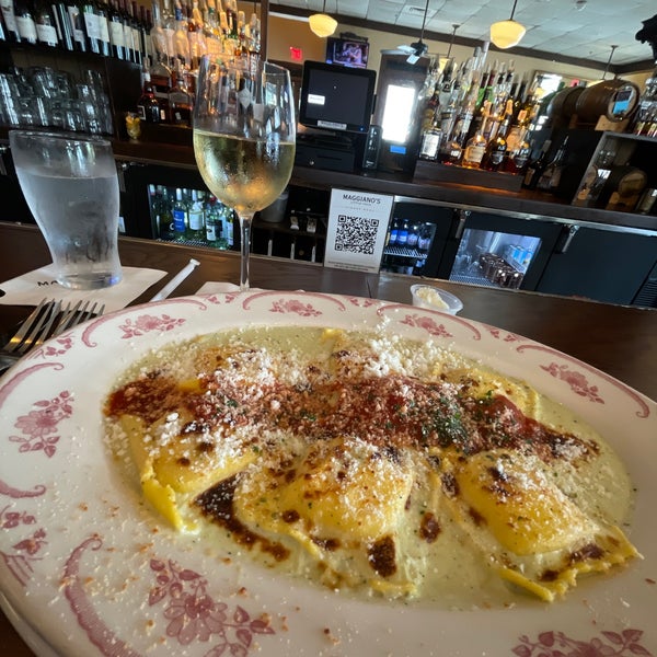Photo taken at Maggiano&#39;s Little Italy by Laura H. on 6/13/2021
