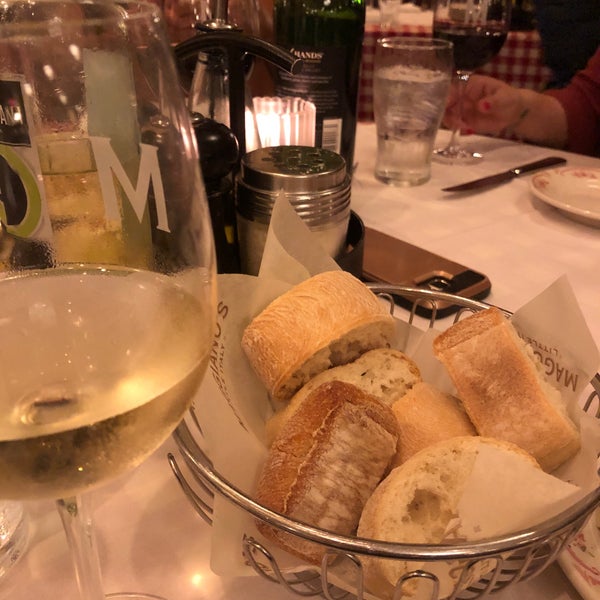 Photo taken at Maggiano&#39;s Little Italy by Laura H. on 11/23/2019