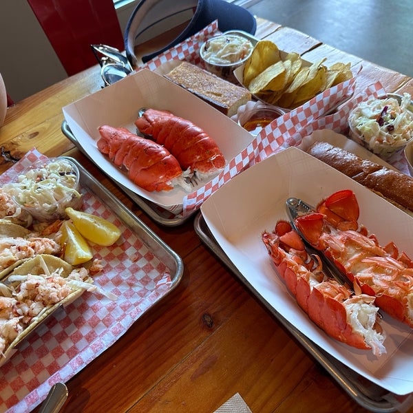 Photo taken at New England Lobster Market &amp; Eatery by Justin D. on 5/14/2023